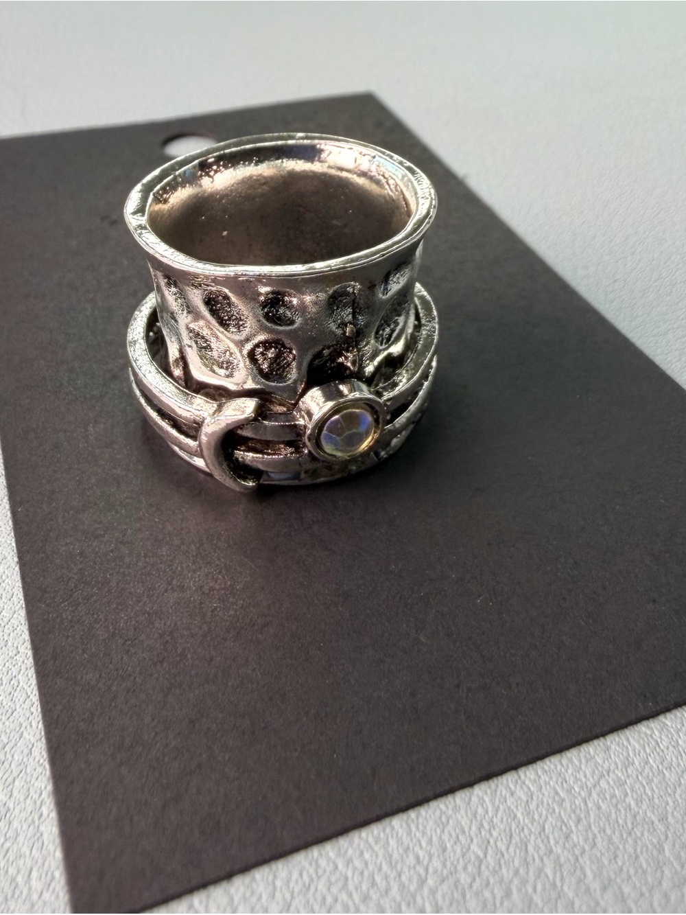Silver-Tone Textured Statement Spinner Ring with Crystal Accent